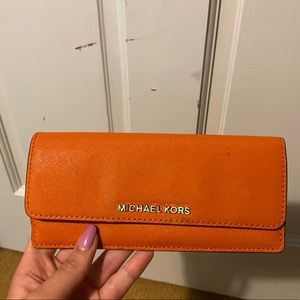Orange Michael Kors wallet